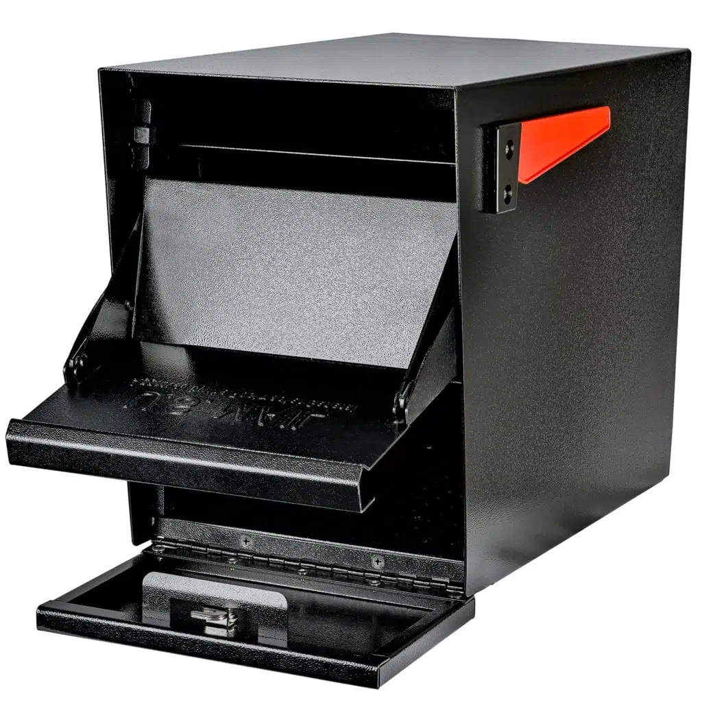 Black desktop paper shredder with red handle and open paper slot.