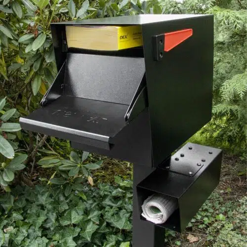 Modern black mailbox with a newspaper holder, set outdoors.