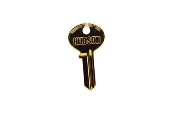 Single uncut key on white background