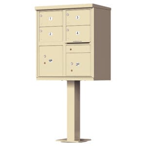 Cluster mailbox with multiple compartments on stand.