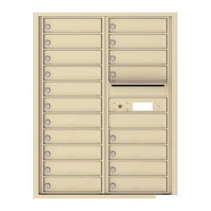 Wall-mounted beige mailbox with multiple compartments.