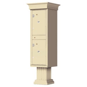 Beige two-door pedestal mailbox unit.